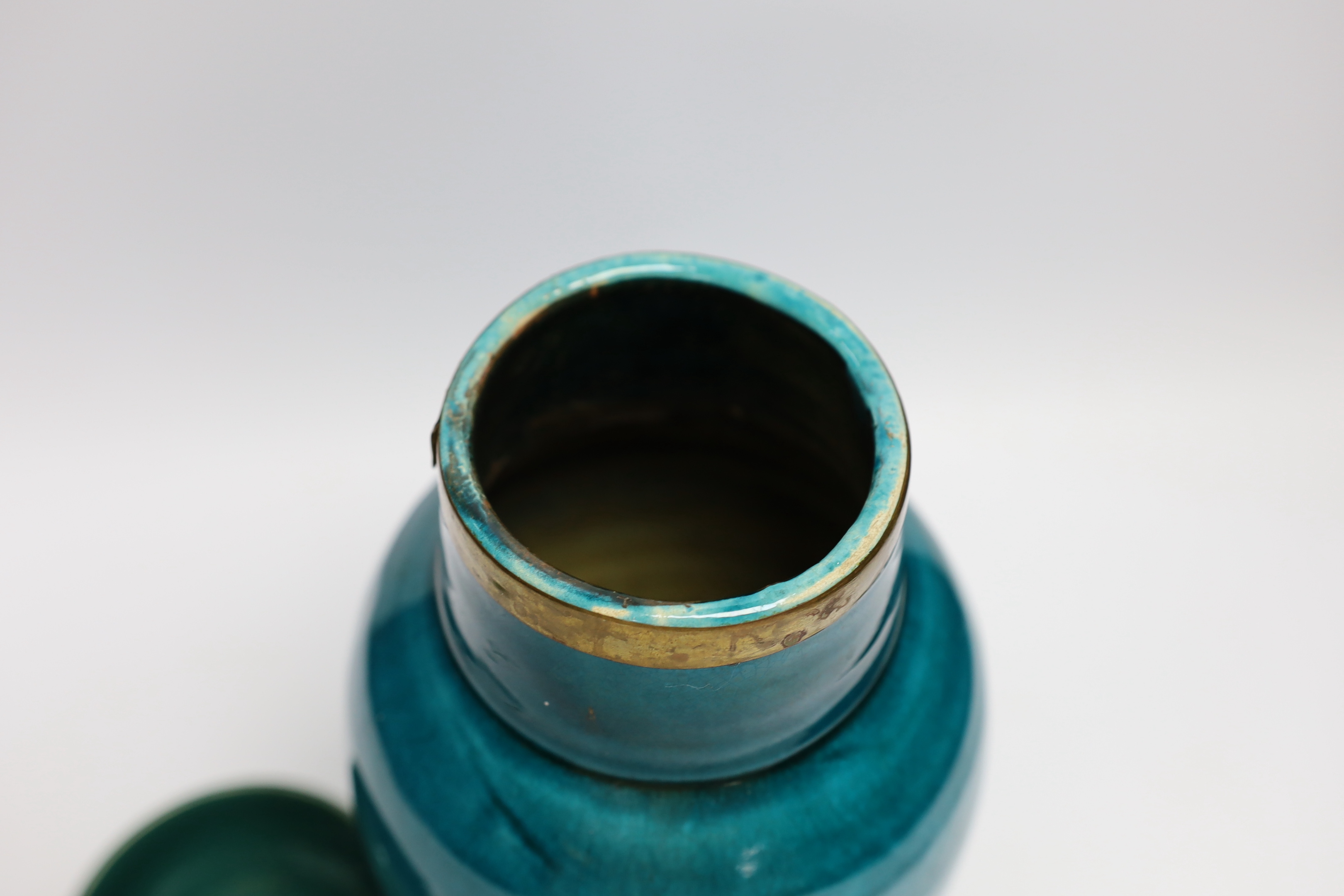 A turquoise glazed three footed bowl and jug and a small Chinese famille rose jug, largest 25cm high
